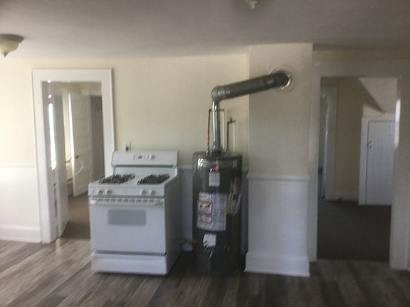 Stove/water heater in kitchen