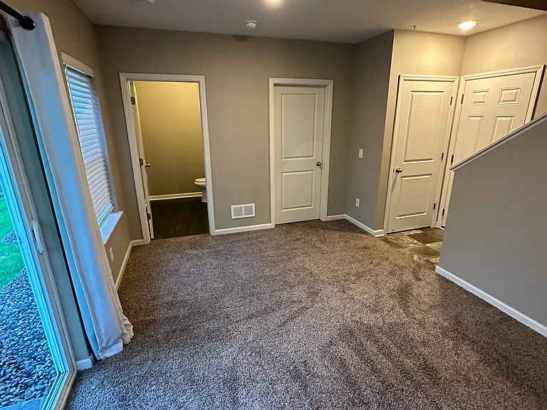 Lower level family room upon entry from garage.