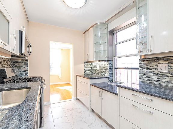 4th image of 6738 108th St APT A56