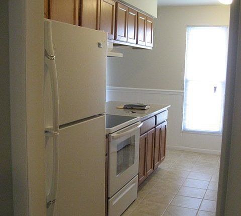 Wonderful kitchen with NEW granite, cabinets, tile flr & appls.