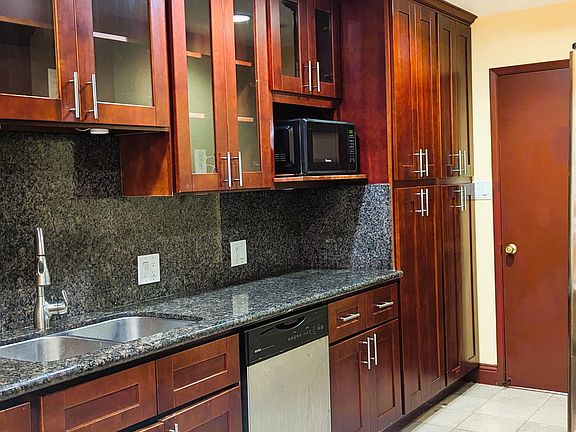 Granite Countertops with Custom Cabinetry
