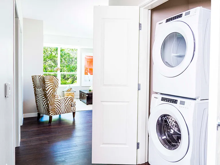 Two-Bedroom Apartment Laundry and Living Room
