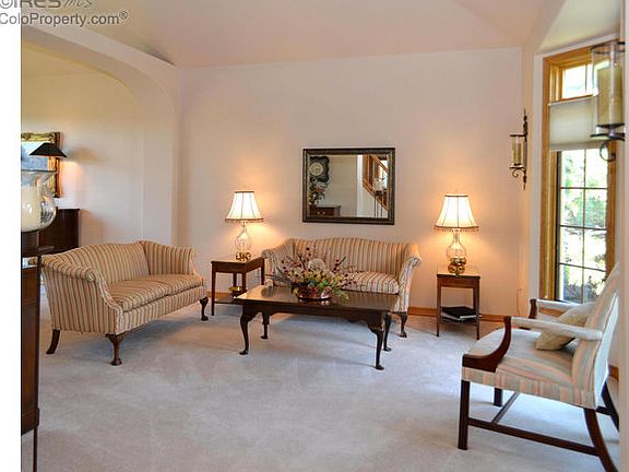 Large rooms with stained wood finishes.