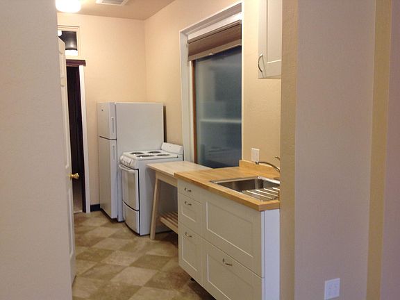 New Galley Kitchen With New Appliances and Plenty of Storage