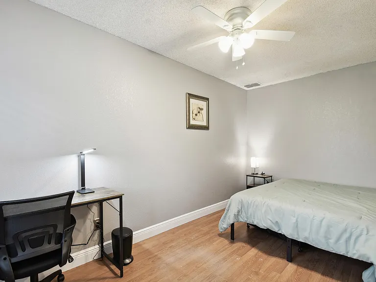 Computer desk, office chair and light