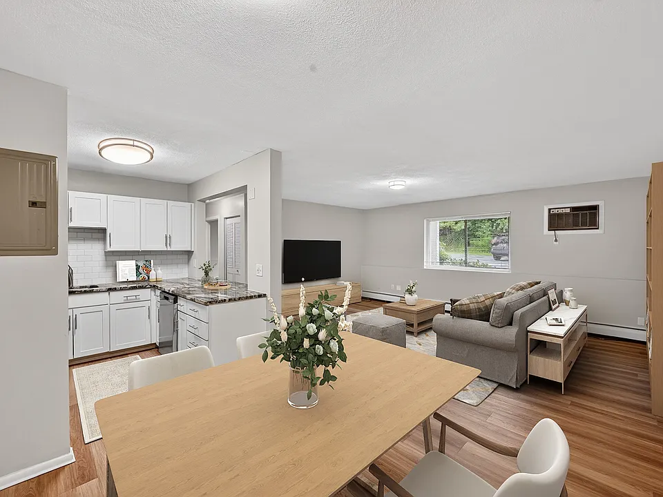 Inviting and modern, Park Village West features beautifully designed living spaces that blend comfort with style. The open layout showcases a spacious kitchen and cozy living area, perfect for gatherings. Explore your new home today!