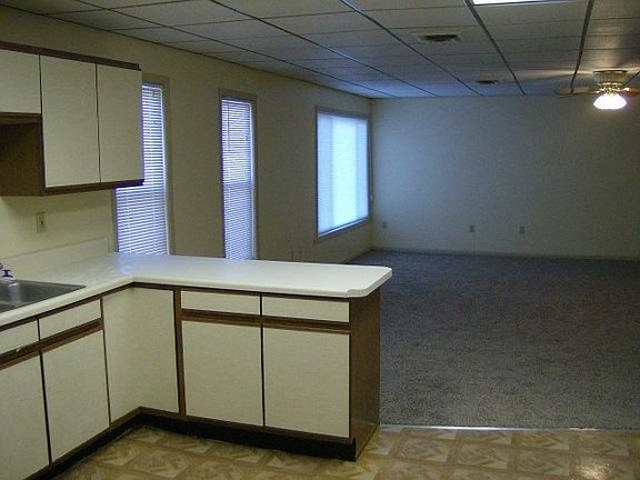 View of west side of living room from kitchen