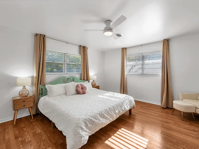 Spacious primary suite with king bed and secure coded entry.