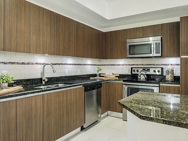 Large Kitchens Connecting to Living and Dining Areas
