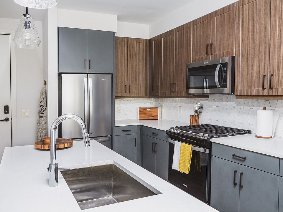 Choice of cabinetry colors schemes: shaker-style wood with grey or flat-front white