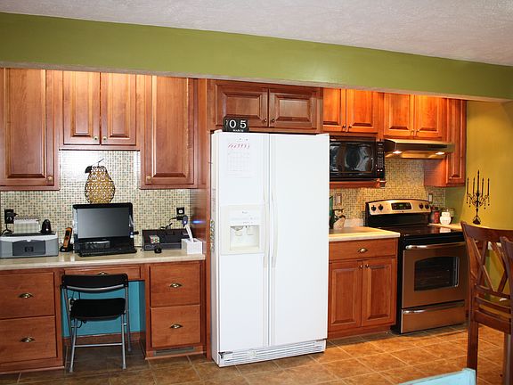 new cabinets with built in desk