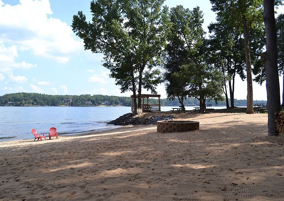 sandy beach and fire pit