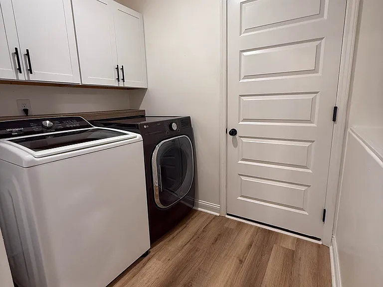 Laundry room shown for layout only _ washer & dryer not included