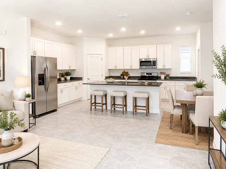 Main level kitchen, dining and living area- Virtually staged
