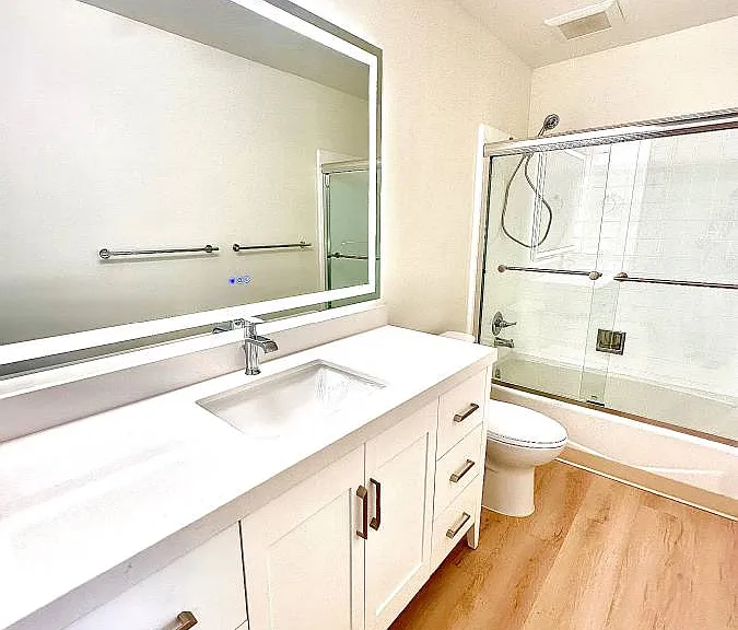 Unit #115 similar huge bathroom with LED lit mirror!