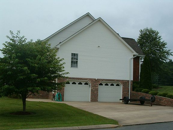 Basement view (five cars, workshop, & storm shelter
