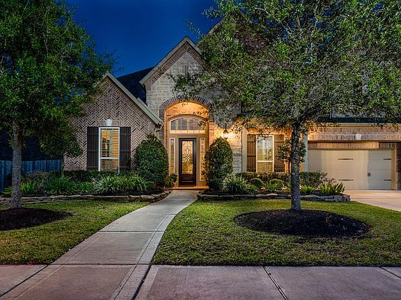 This home exudes warmth and is just as inviting at night as it is during the daylight hours!