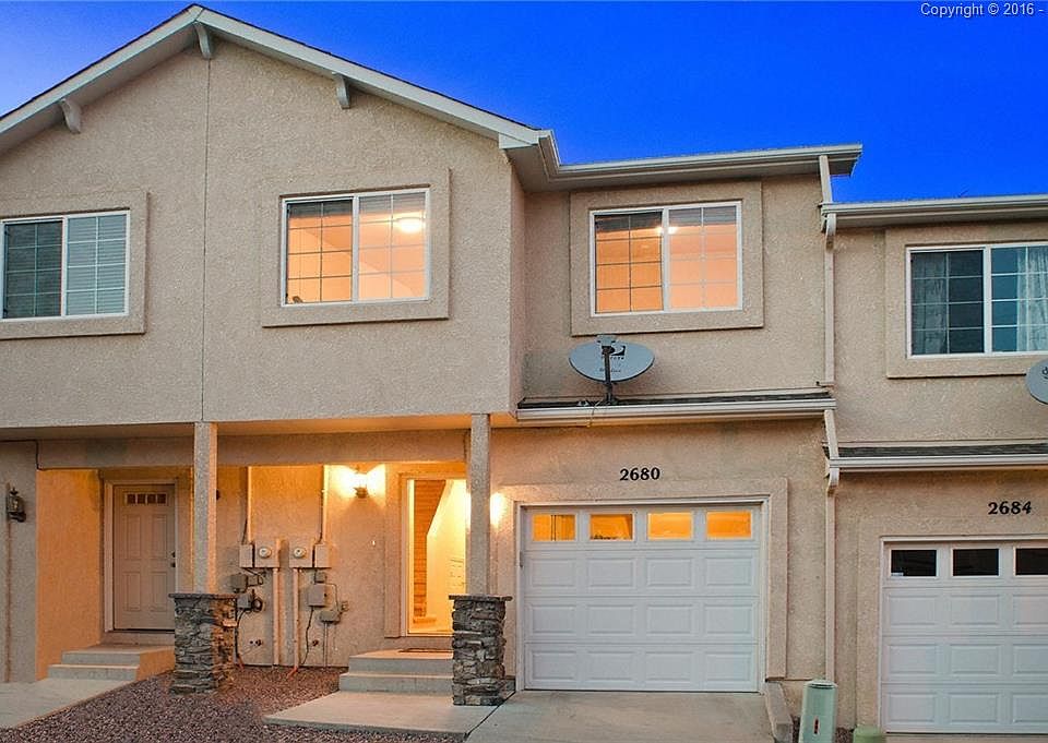 Stucco 2-Story Townhome in Secluded Complex w/Great West Side Location