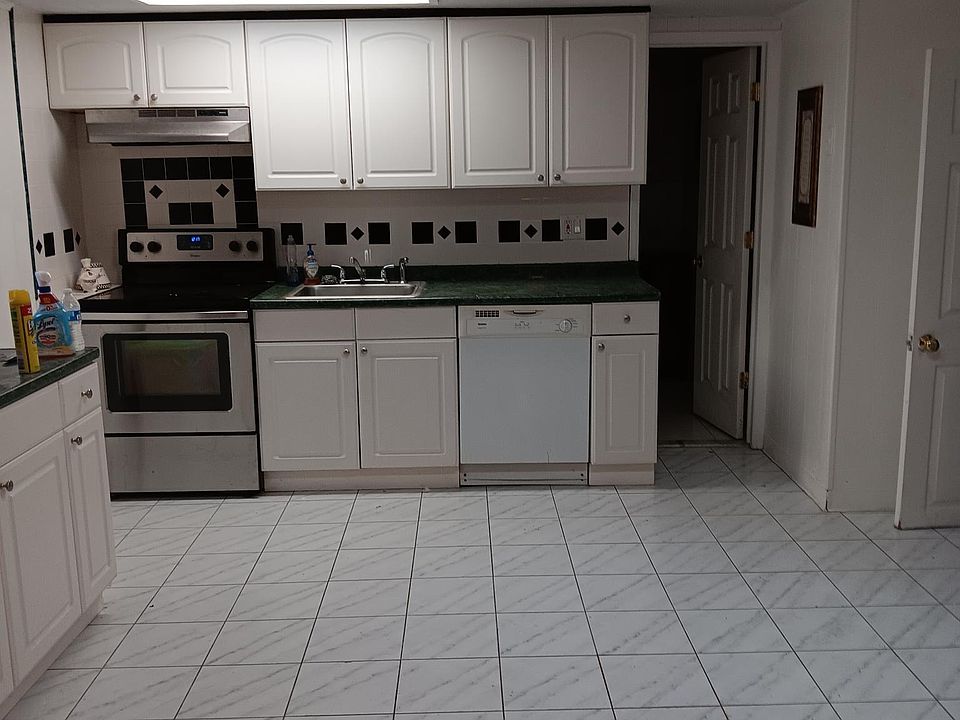 Kitchen with brandnew refrigerator