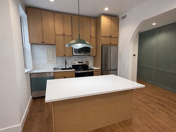 Kitchen area with island