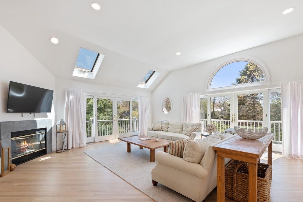 Sun filled living with fireplace