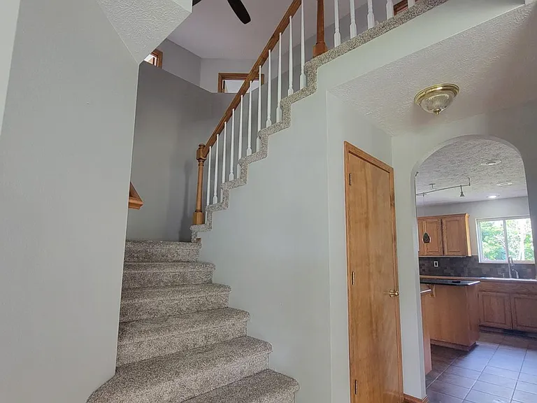 upstairs leads to bedrooms
