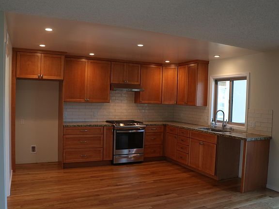 Newly remodeled kitchen. Granite counters, stainless steel appliances.