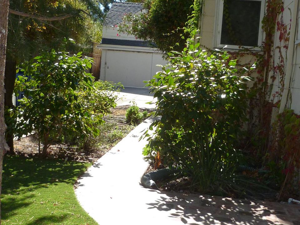 Brick path to Laundry room