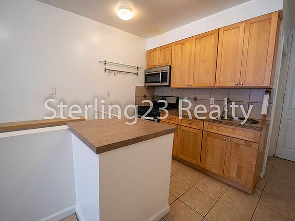 5th image of 25-10 23rd Ave #1A