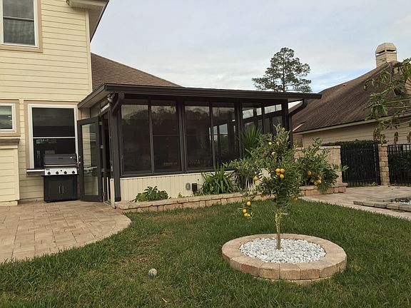 BACK YARD/FLORIDA ROOM