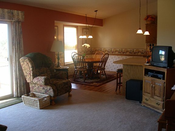 Living room walks out to 2 tiered deck