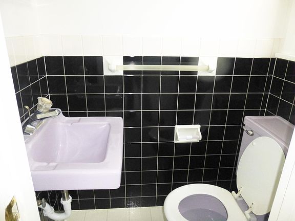 new white toilet and sink being installed