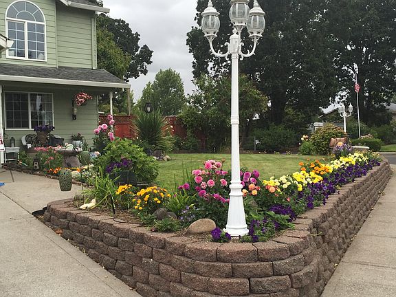 Lamps at each corner of yard