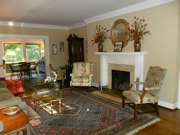 Living room with view of den