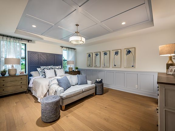 Relax in the spacious primary bedroom suite