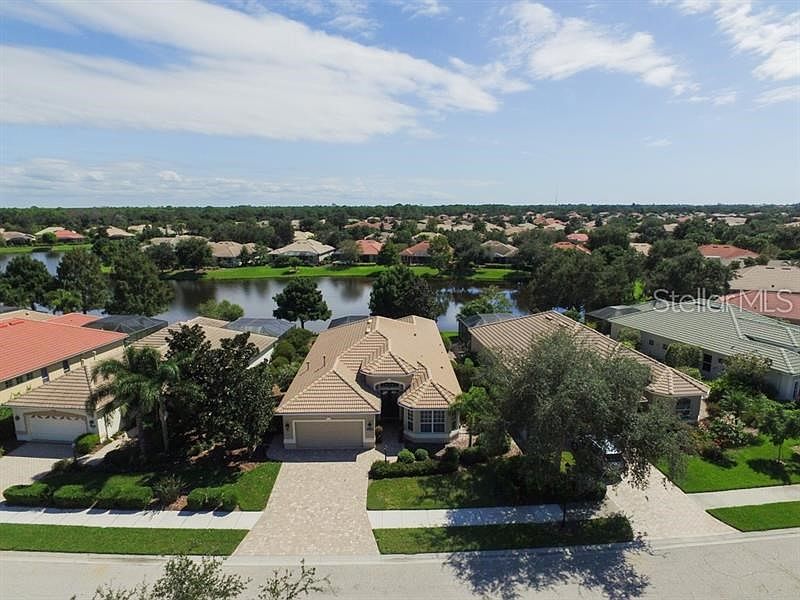 Elegantly appointed, pool home with a beautiful lake view.