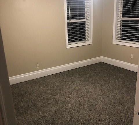 One of two bedrooms. Each bedroom has its own closet