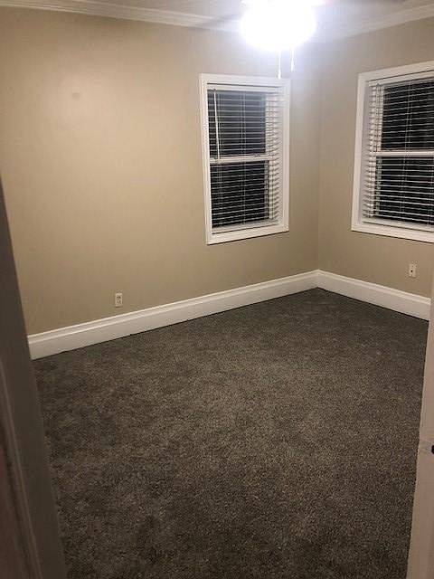 One of two bedrooms. Each bedroom has its own closet
