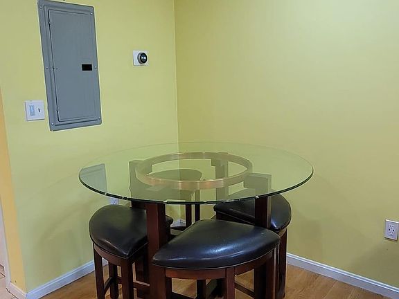 Dining Area with ultra modern Italian space saving dining table and chairs