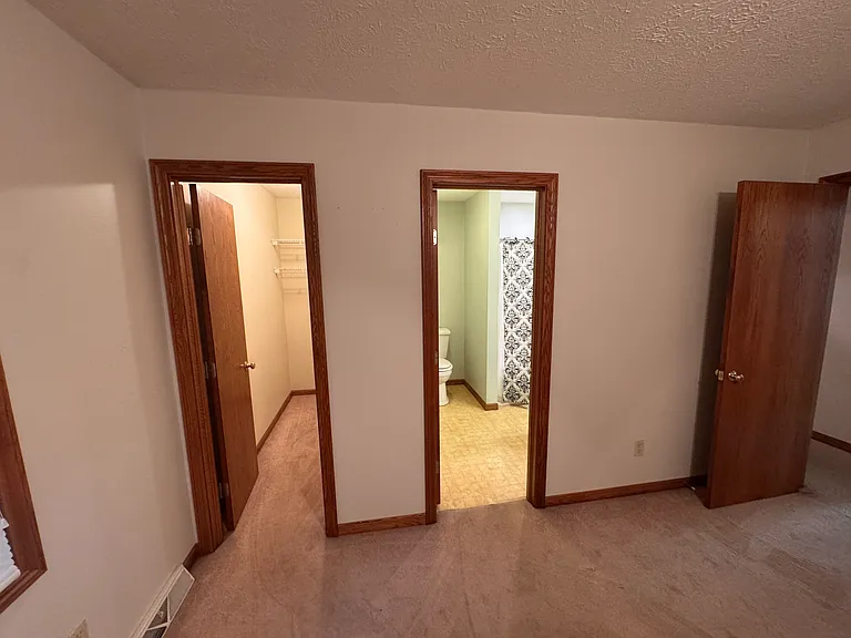 Master Bedroom - View to Walk In Closet and Master Bath