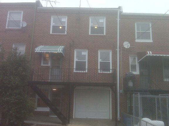 Back of home, 1 car garage