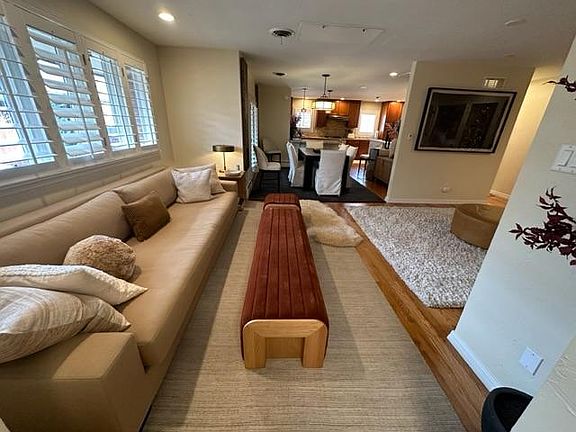Large open living area with lovely natural light.