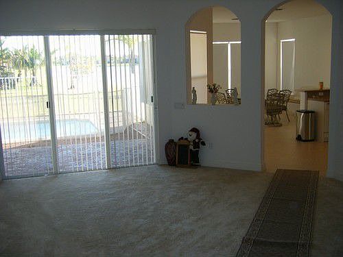 Living room opening to kitchen