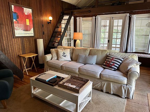 Cozy living area w/ working fireplace; big-screen TV w/ generous cable/streaming package; strong wireless