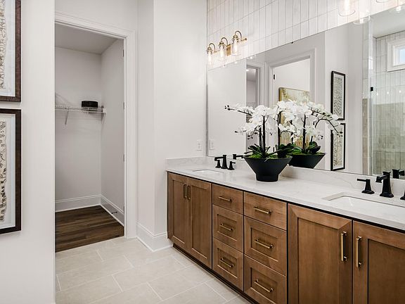 Spa-like primary bathroom with a zero-threshold shower