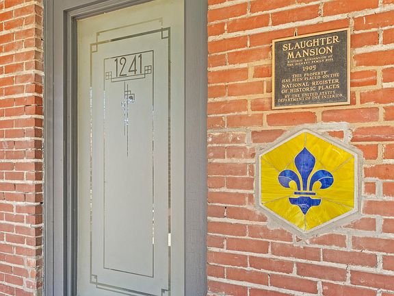 "National Register of Historic Places" by the US Department of Interior plaque.