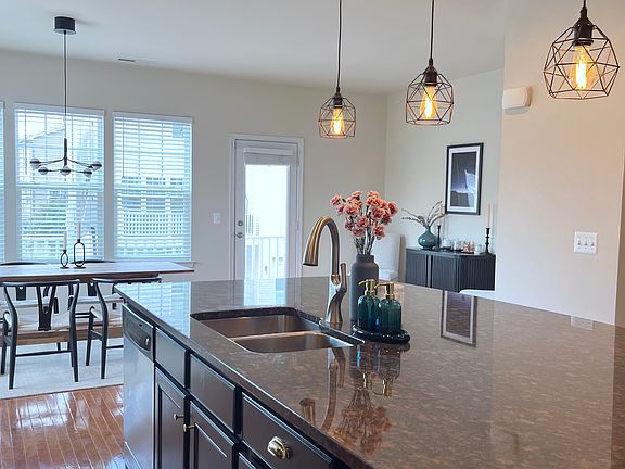 Large kitchen island convenient for daily breakfasts before running out the door.