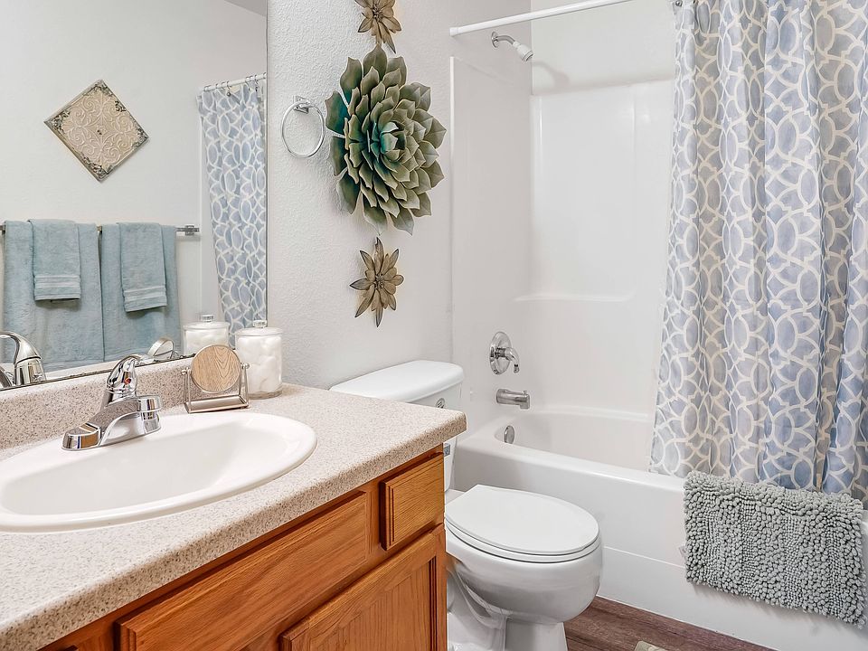 Gorgeous bathroom with great counter space and storage
