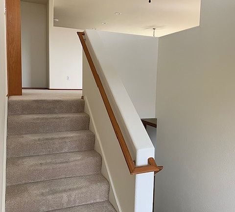 Entry from front door to upper or lower floor