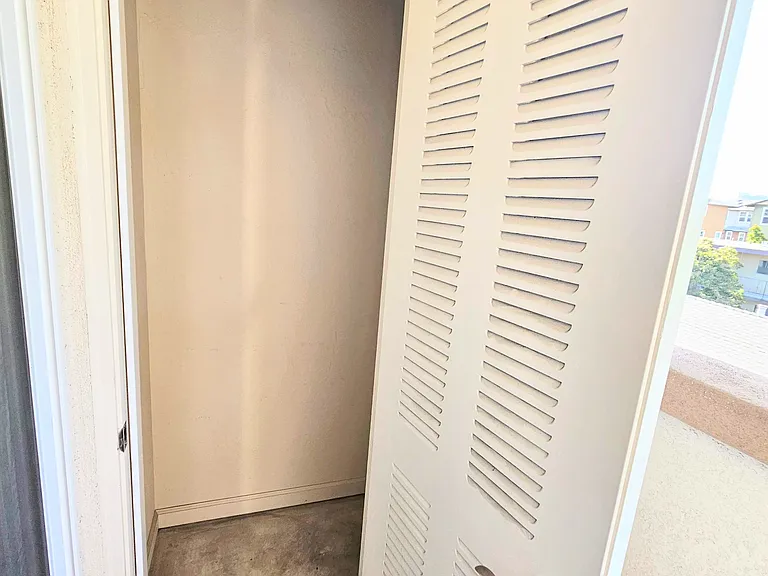 Small storage off the small balcony, great for seasonal decorations or empty luggage - items that are not temp sensitive